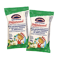 Riegel aus Frischkäsemasse "Utrennij" mit 15% Apfel-Rosinen-Zubereitung mit Apfelkuchenaroma, 31% Fett i. Tr. im Milchanteil, tiefgefroren.